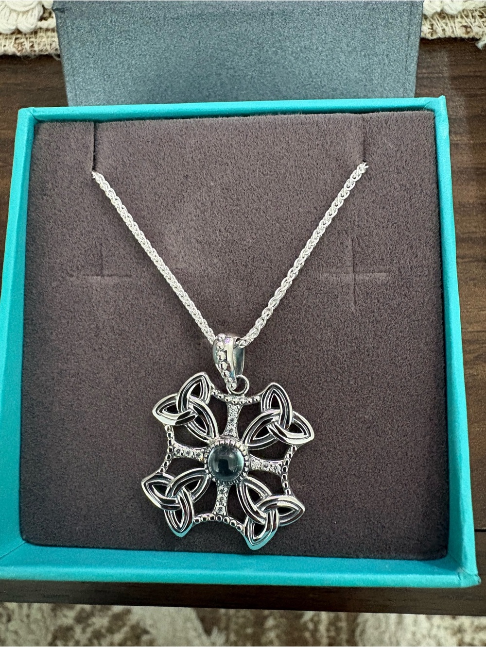 Silver Celtic Flower Pendant Necklace with blue topaz.